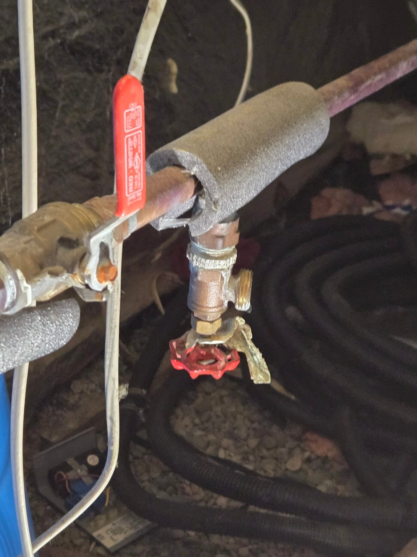 Shut-off valve and insulated water lines in a crawlspace