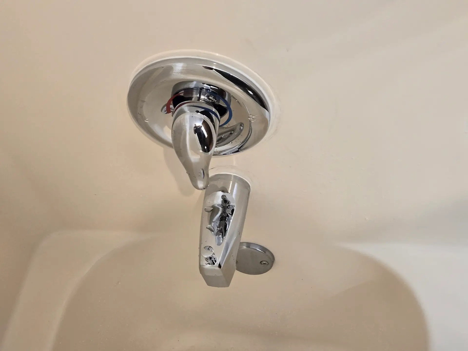 Tub and shower valve trim being serviced for drips