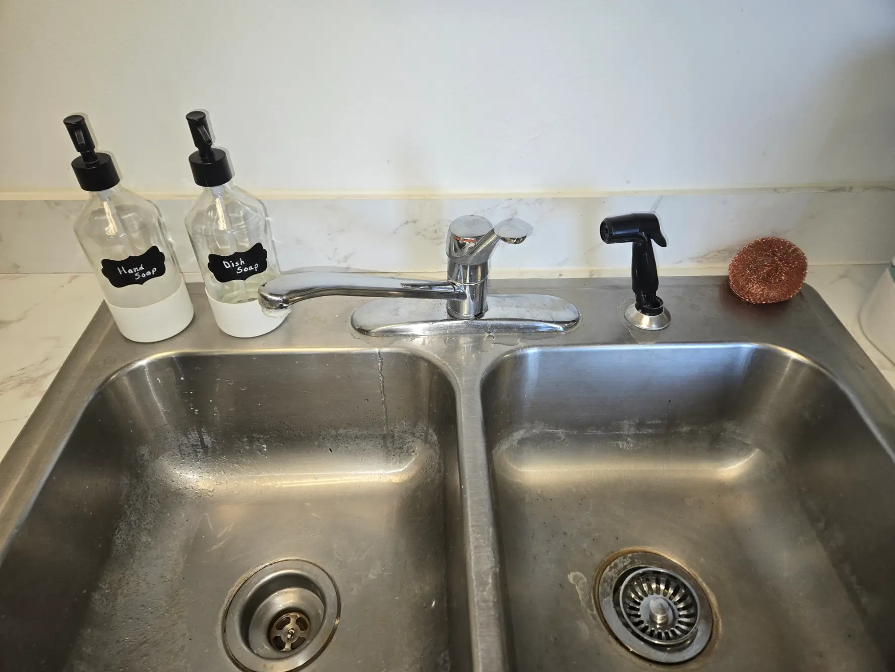 Double kitchen sink with new faucet and sprayer