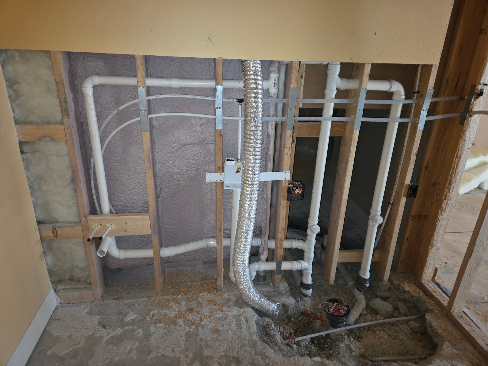 Bathroom remodel with new drain and vent rough-in plumbing
