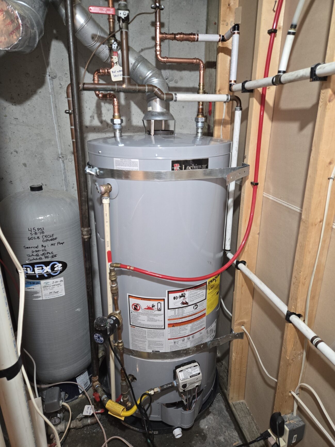 Gas water heater with expansion tank and copper piping