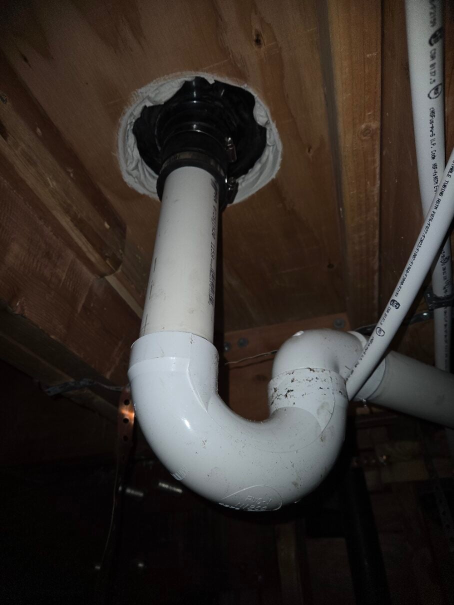 PVC drain P-trap under the floor