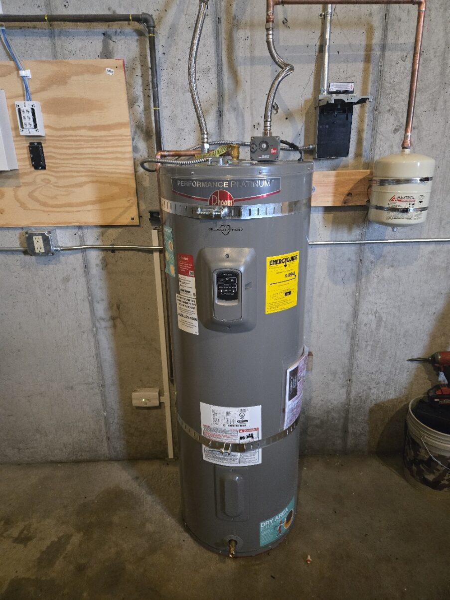 Electric water heater installed in a basement