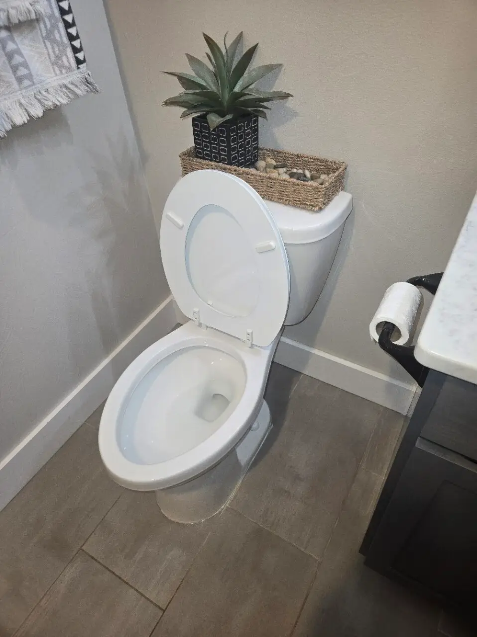 New toilet installation in a finished bathroom
