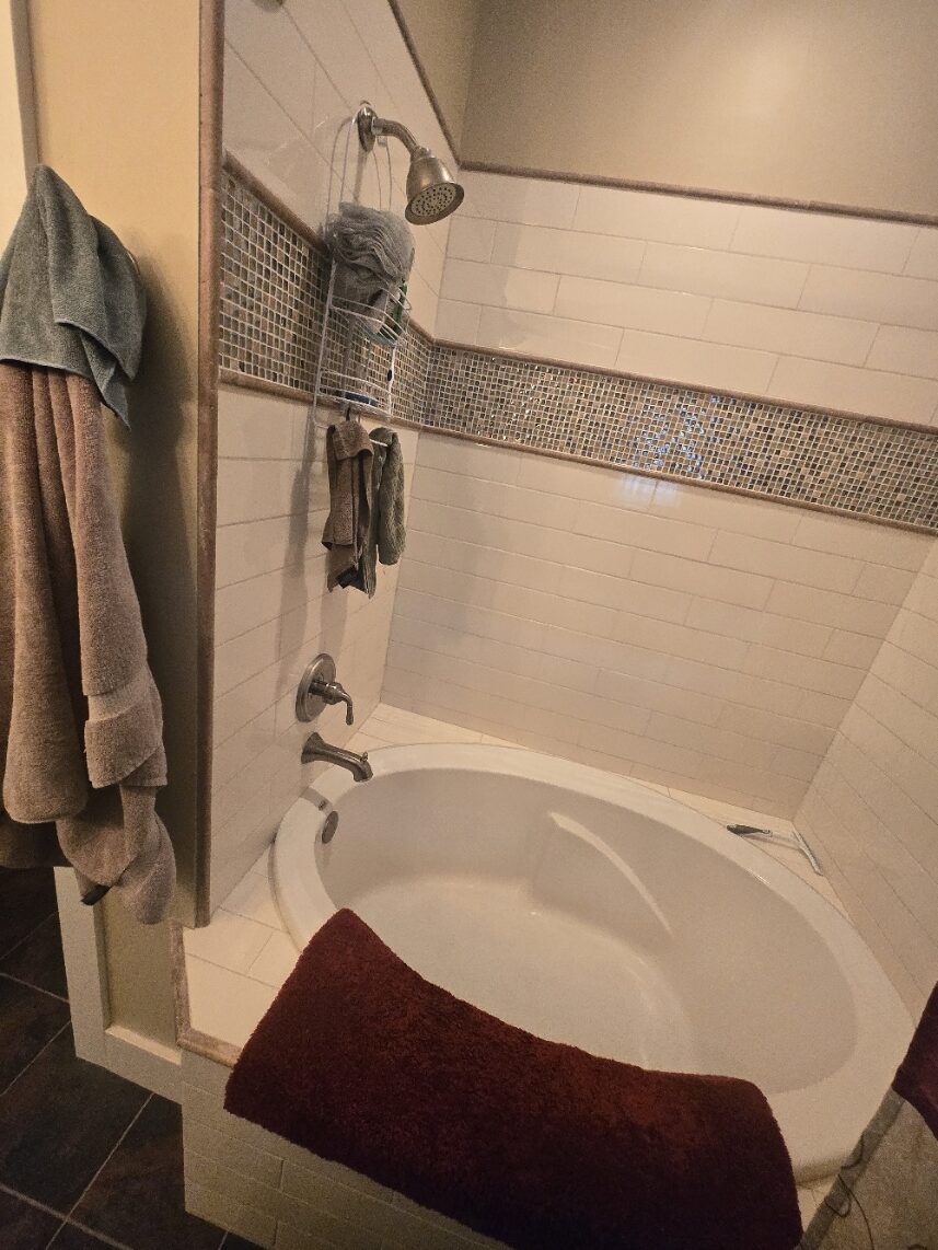 Remodeled tile shower and soaking tub by Lucas Plumbing